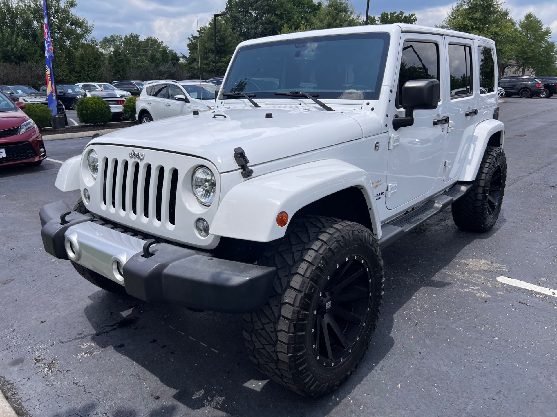 Used 2015 Jeep Wrangler Unlimited SAHARA FREEDOM TOP W/AFTERMARKET For