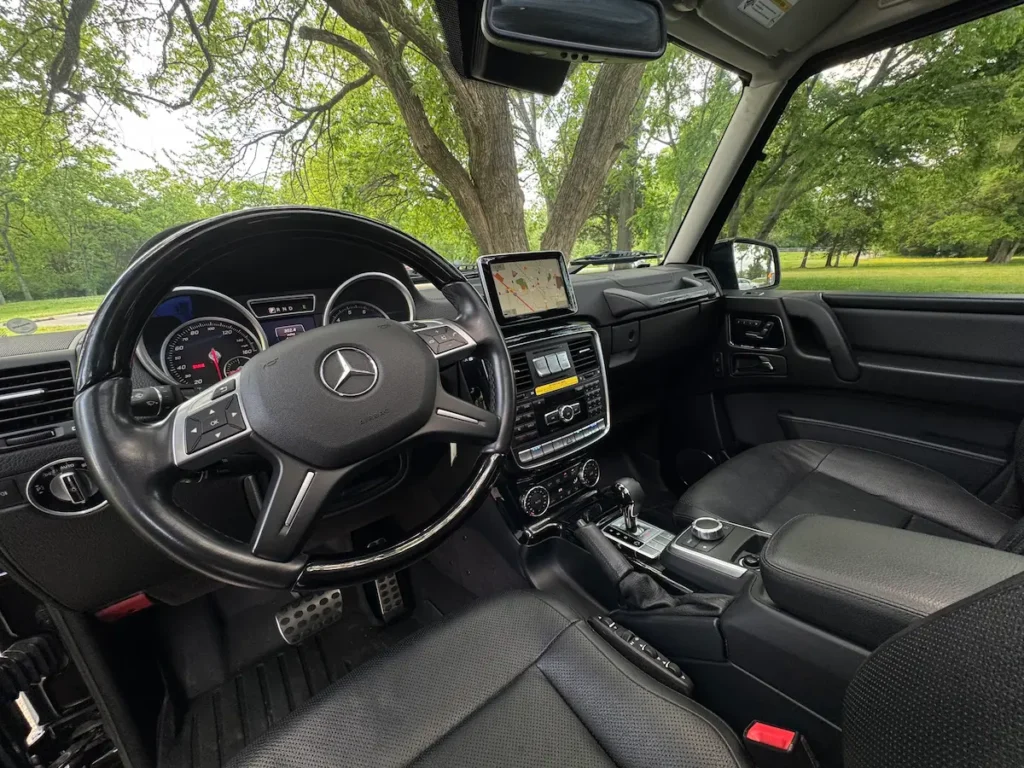 2016 Mercedes-Benz G550 steering wheel, analog instrument cluster and center controls
