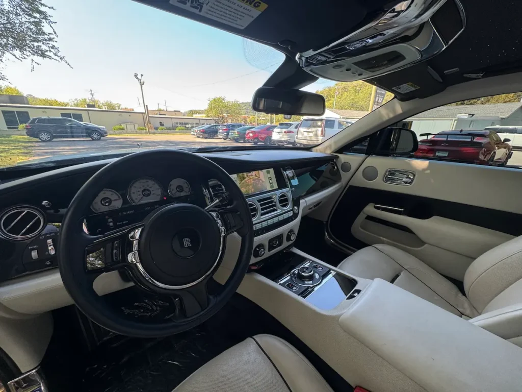 Front interior cockpit of a 2016 Rolls-Royce Wraith