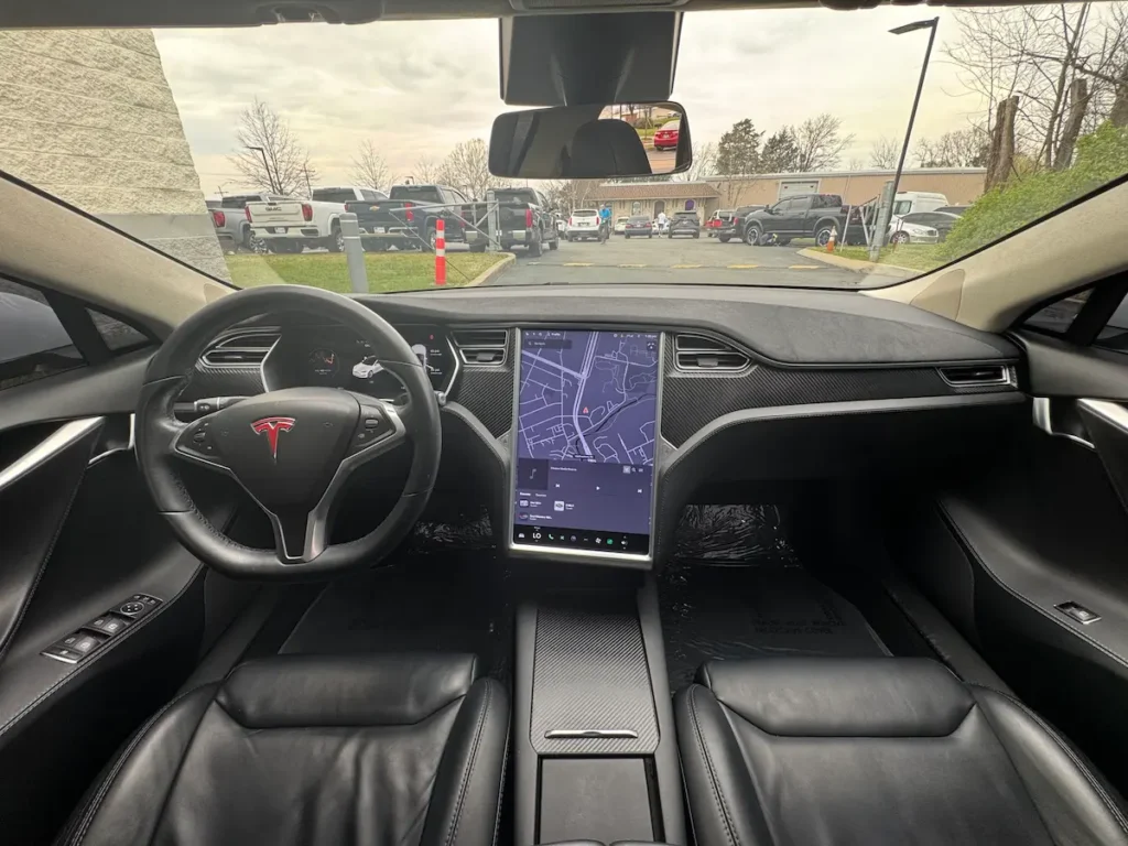 Front interior dashboard of 2017 Tesla Model S 90D with touchscreen
