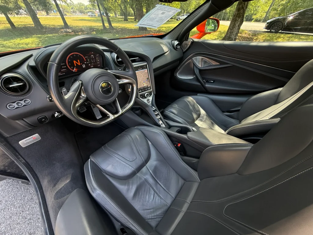 Interior cabin of 2018 McLaren 720S Luxury with leather seats and digital cockpit.