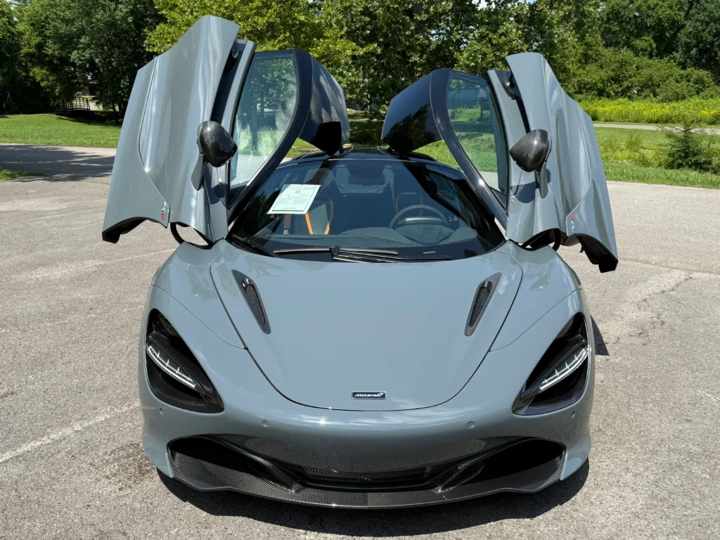 2019 McLaren 720S Performance in gray with dihedral doors open.