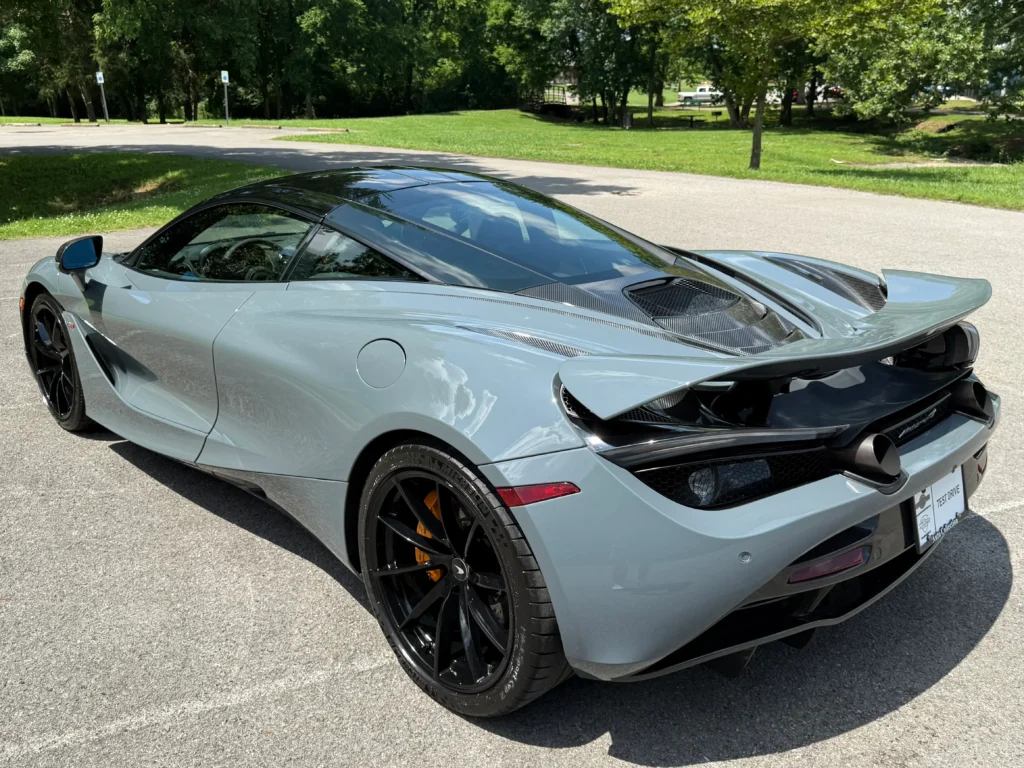 Rear view of 2019 McLaren 720S Performance in gray with active spoiler.