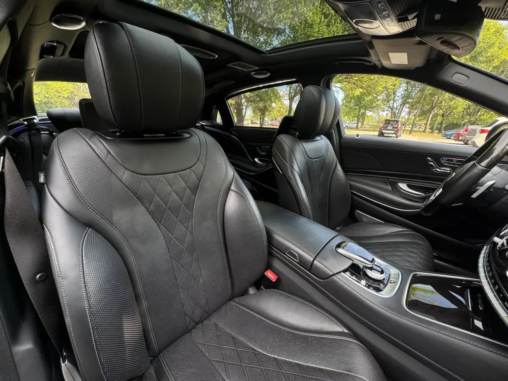 2020 Mercedes-Benz S650 Maybach black leather front seats with quilted pattern and center console.