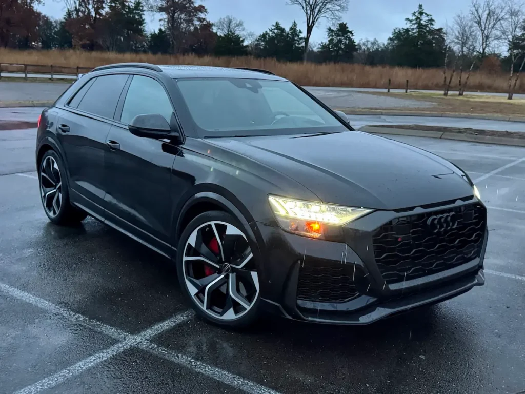 2021 Audi RSQ8 in black shown from front angle with LED headlights and sport styling.