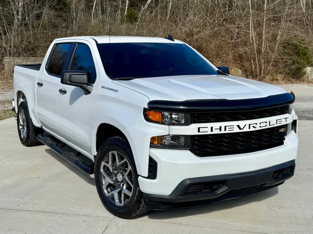 2021 Chevrolet Silverado 1500 Custom in white parked at AutoPro Nashville