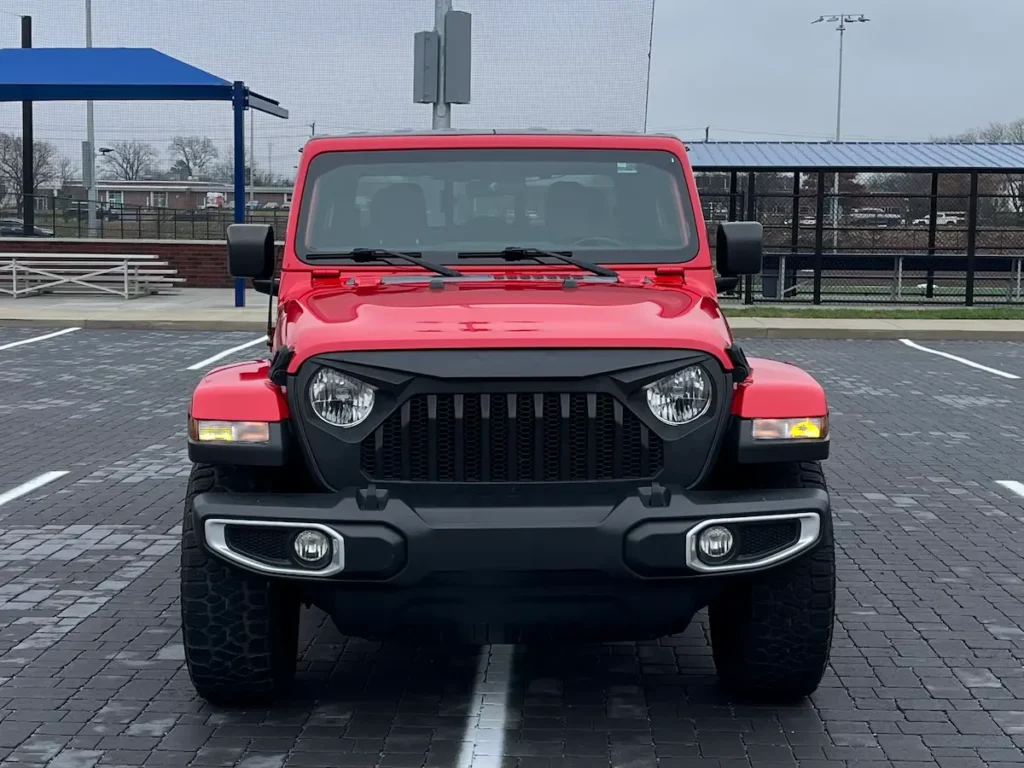 Front view of 2021 Jeep Gladiator Sport with Jeep grille