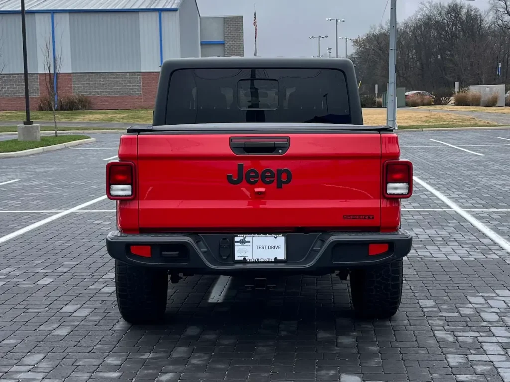 Rear view of 2021 Jeep Gladiator Sport pickup bed and tailgate