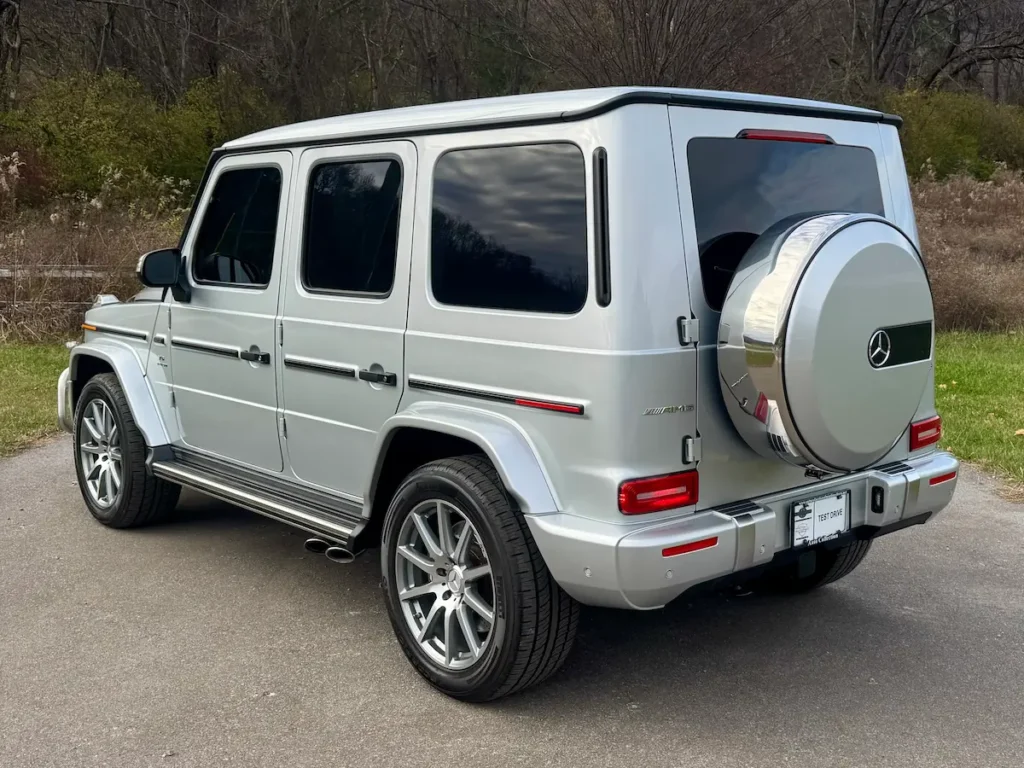 2021 Mercedes-AMG G 63 silver SUV rear exterior view with spare tire cover