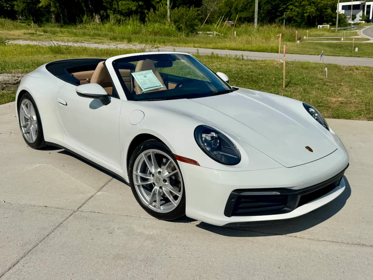 White 2021 Porsche 911 Carrera Cabriolet with the roof open