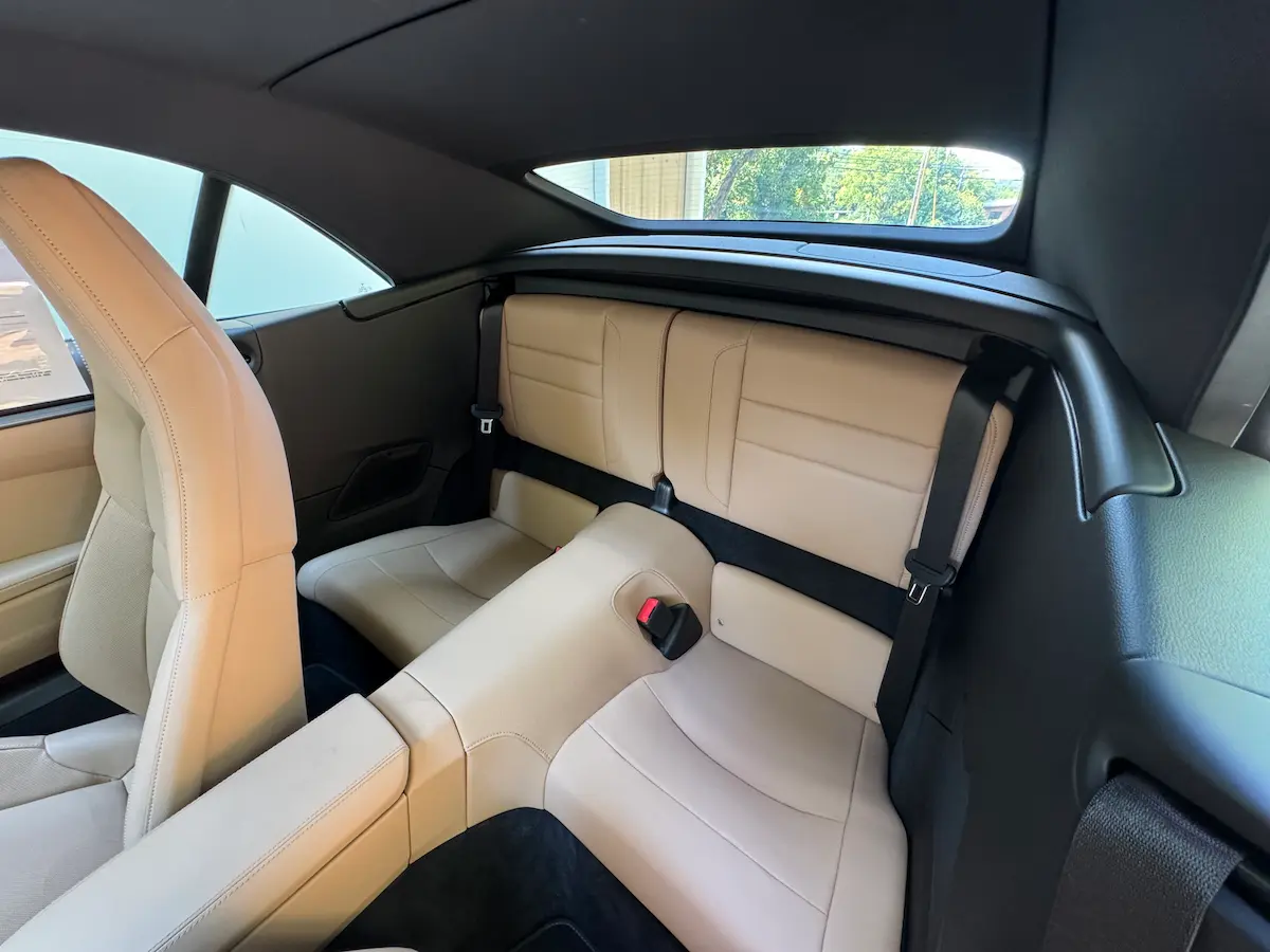 Tan leather rear seats inside a 2021 Porsche 911 Carrera Cabriolet