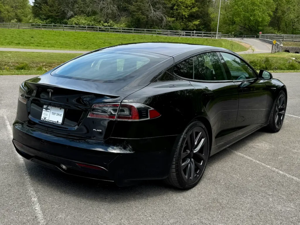 Rear three-quarter view of black 2021 Tesla Model S Plaid