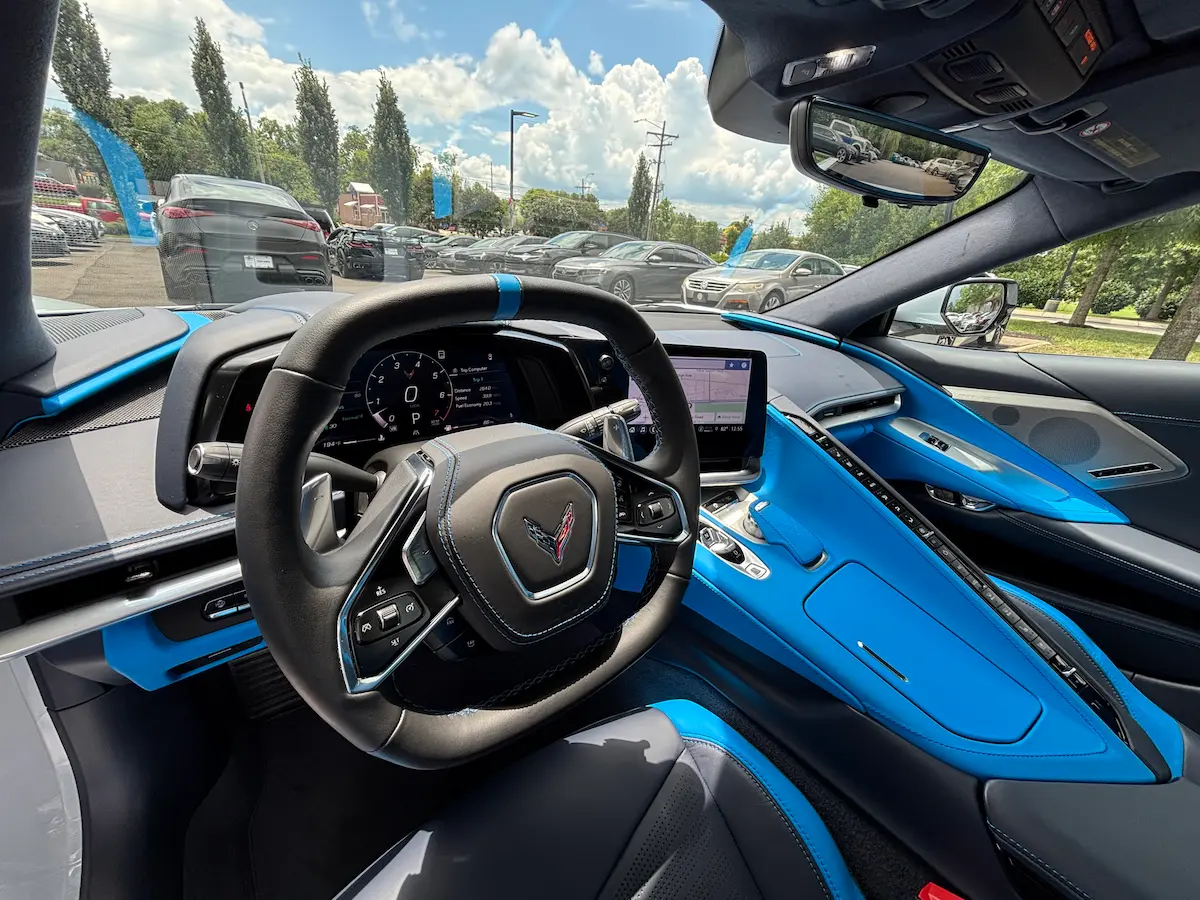 Blue interior and driver cockpit of a 2022 Chevrolet Corvette Stingray 3LT