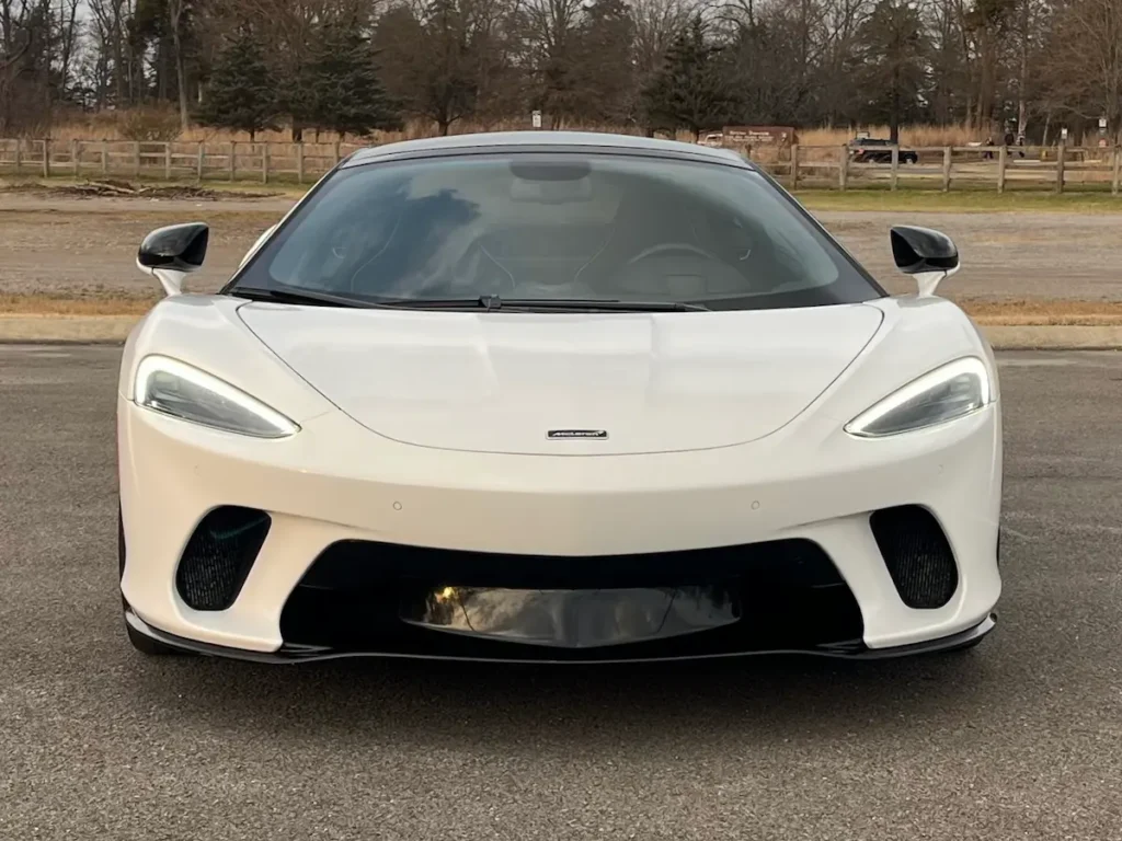 Front exterior view of a white 2022 McLaren GT