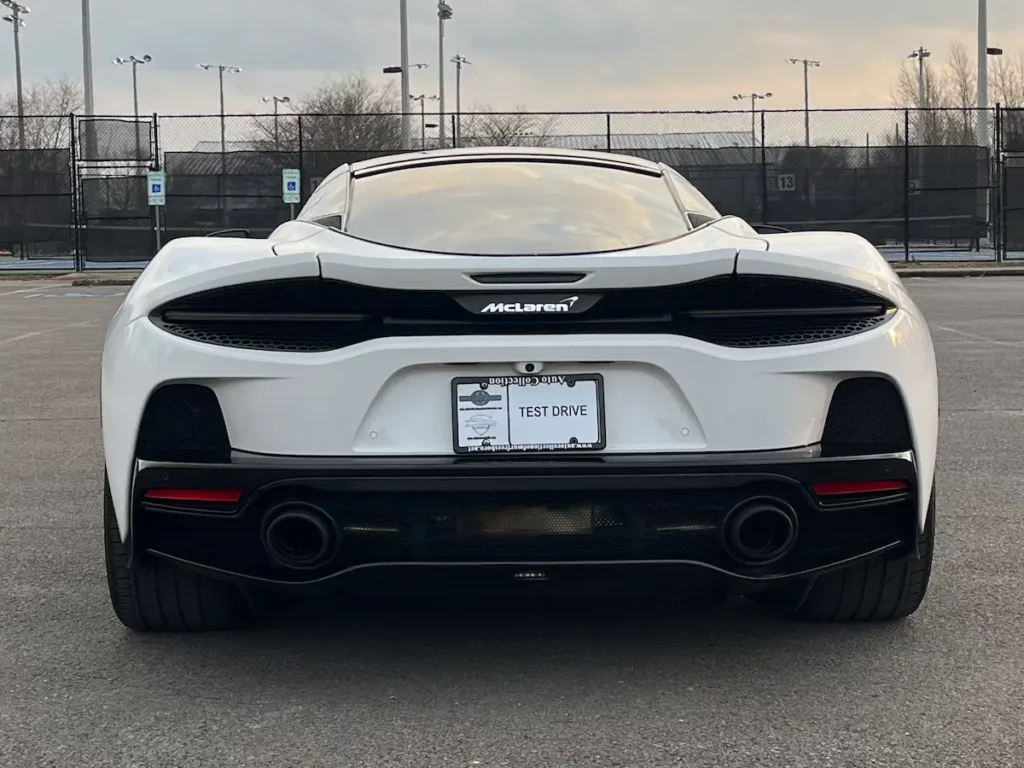 Rear exterior view of a white 2022 McLaren GT