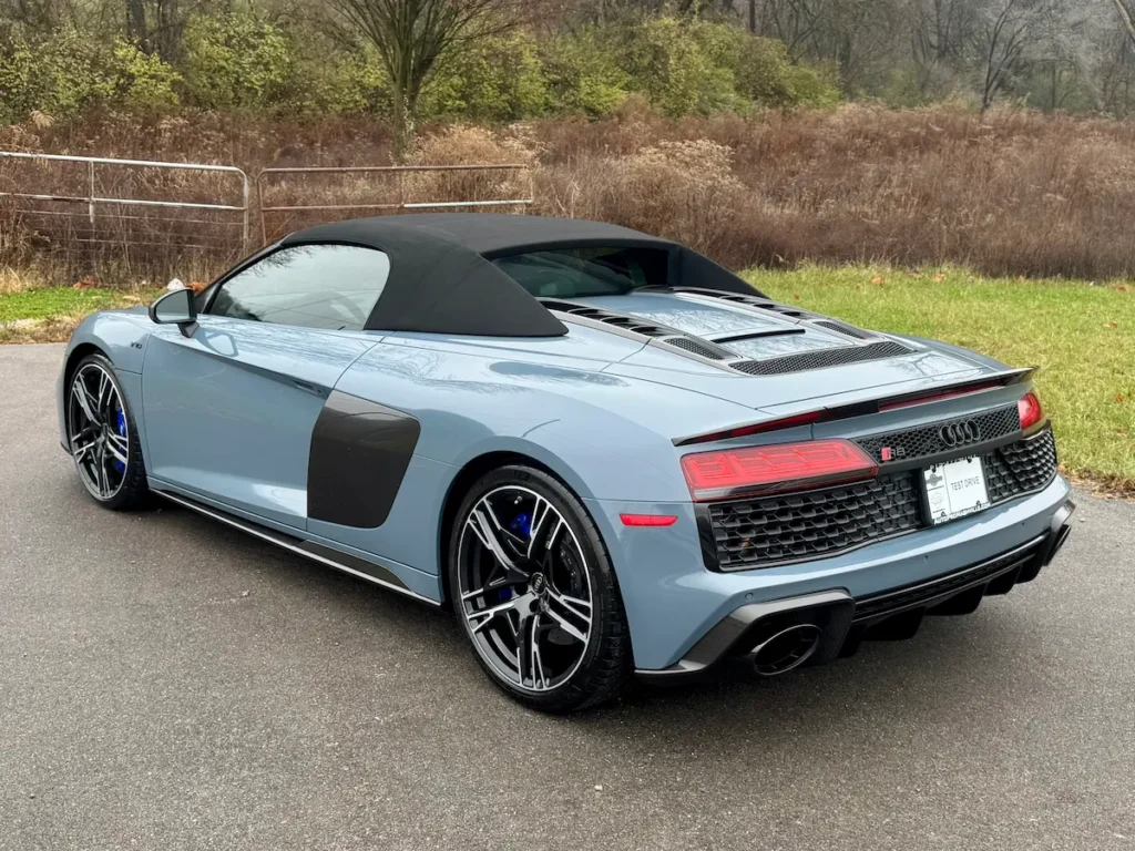 2023 Audi R8 Spyder rear exterior with soft top, used performance sports car