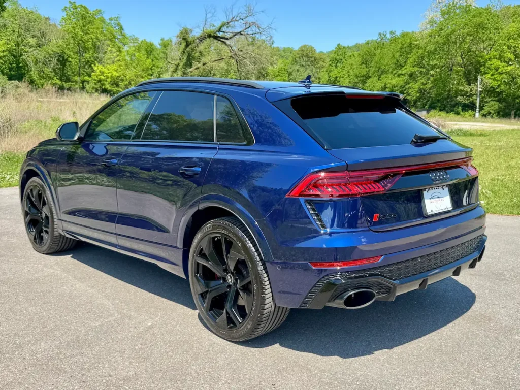 2023 Audi RS Q8 blue SUV rear view with black wheels