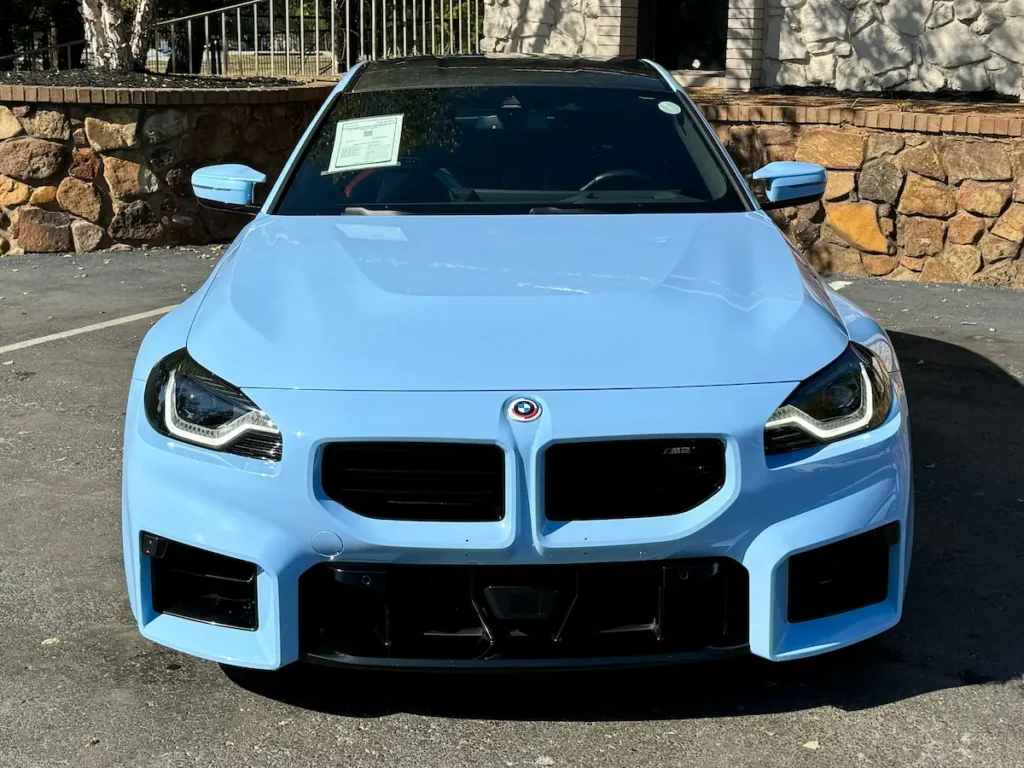 2023 BMW M2 front view with kidney grille and aggressive performance styling