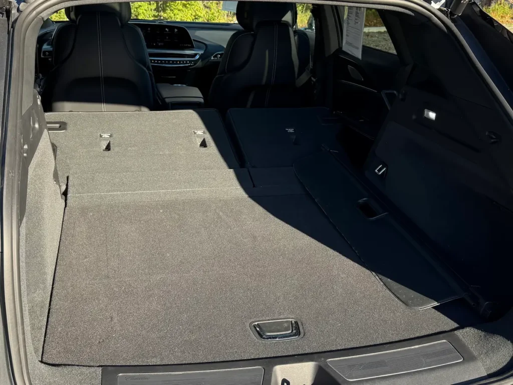 2023 Cadillac Lyriq cargo area with rear seats folded flat for maximum storage space