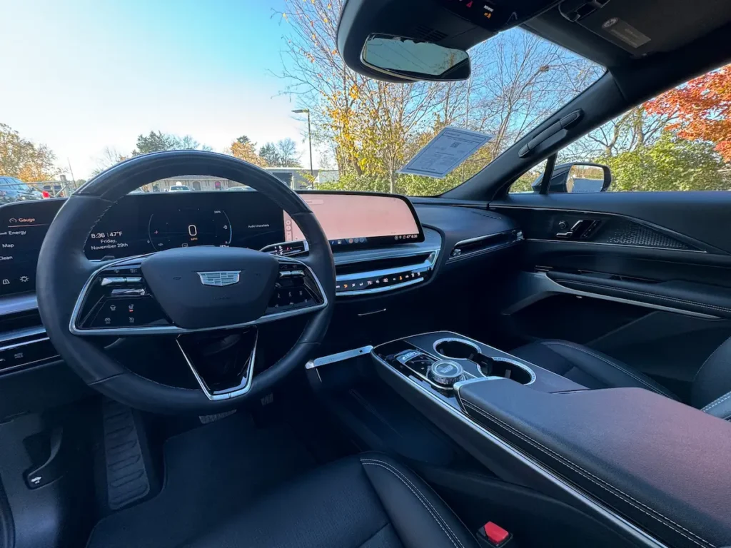 2023 Cadillac Lyriq interior with digital dashboard, panoramic display, and premium cabin materials