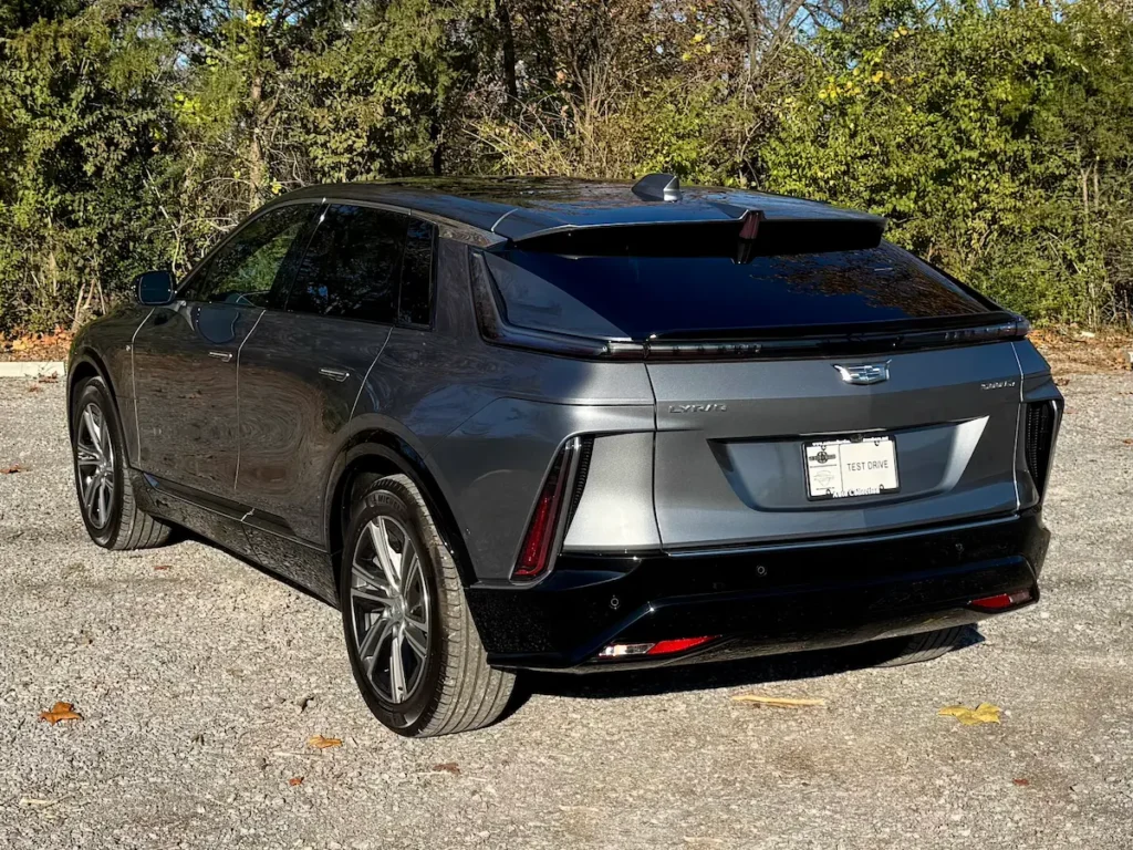 2023 Cadillac Lyriq rear exterior view featuring full-width tail light and sculpted EV design