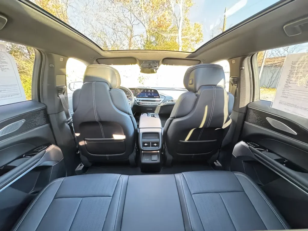 2023 Cadillac Lyriq second-row seating with panoramic roof and premium cabin materials