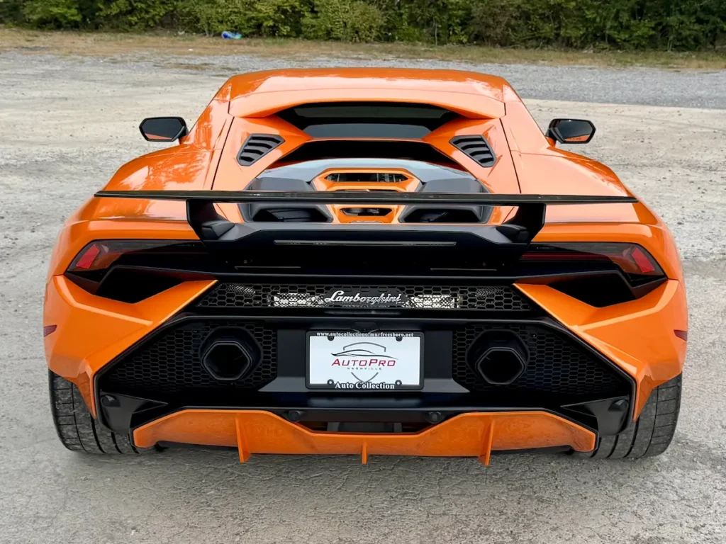 2023 Lamborghini Huracan orange rear exterior with wing and diffuser