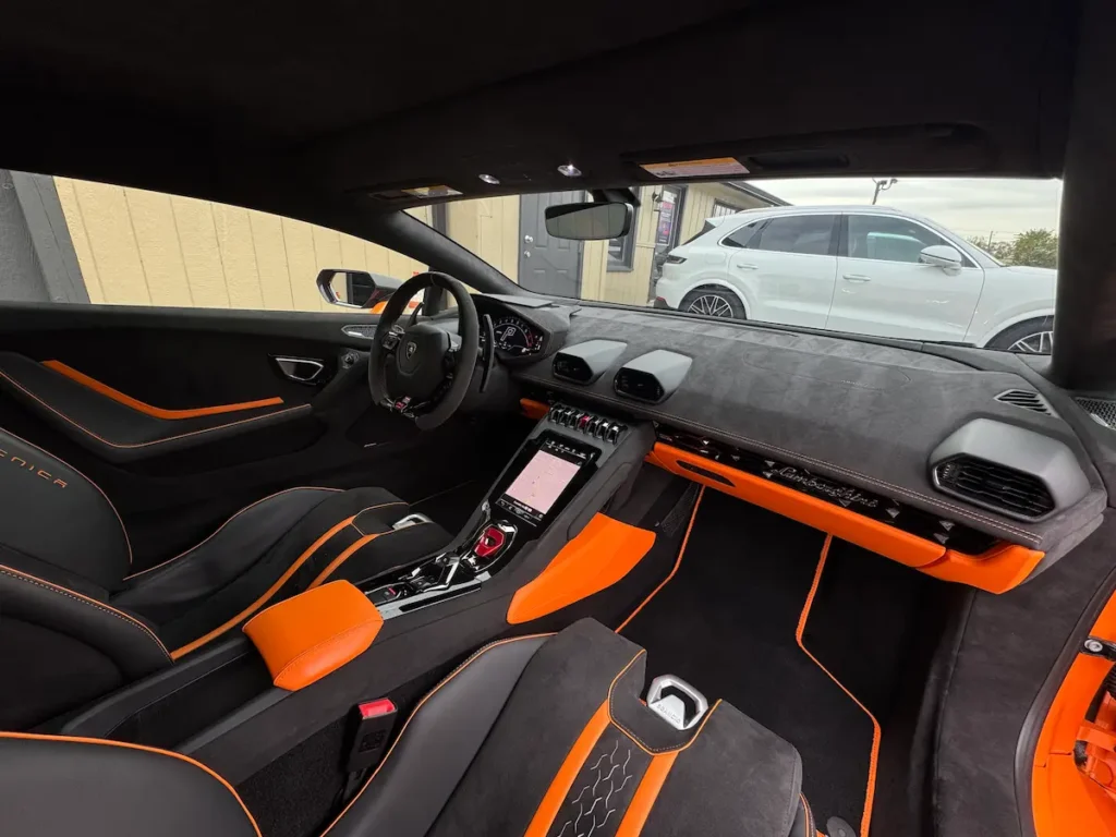 2023 Lamborghini Huracan interior with Alcantara trim and orange accents