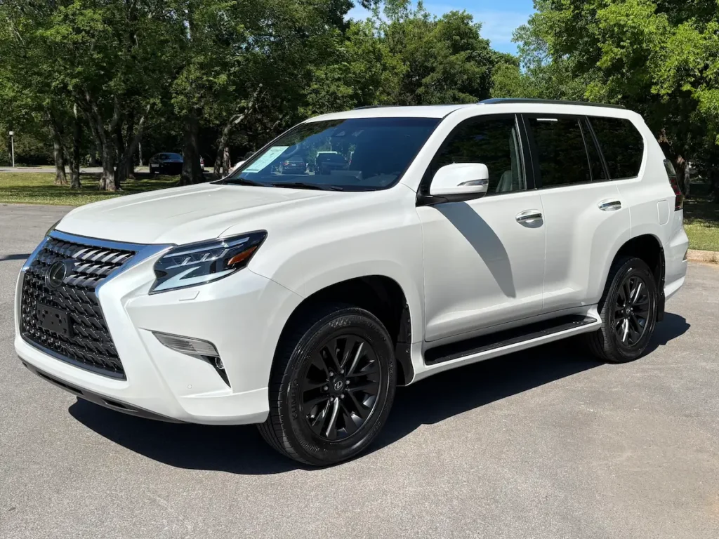 White 2023 Lexus GX 460 luxury SUV shown from the front three-quarter angle.