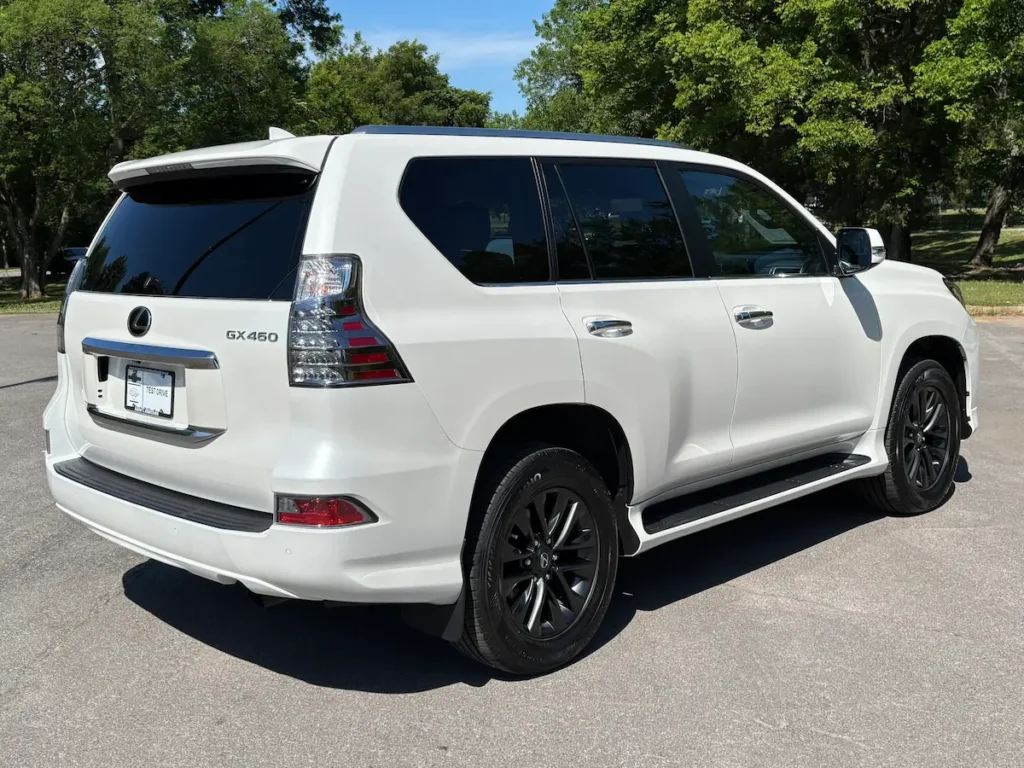 White 2023 Lexus GX 460 shown from the rear three-quarter angle.