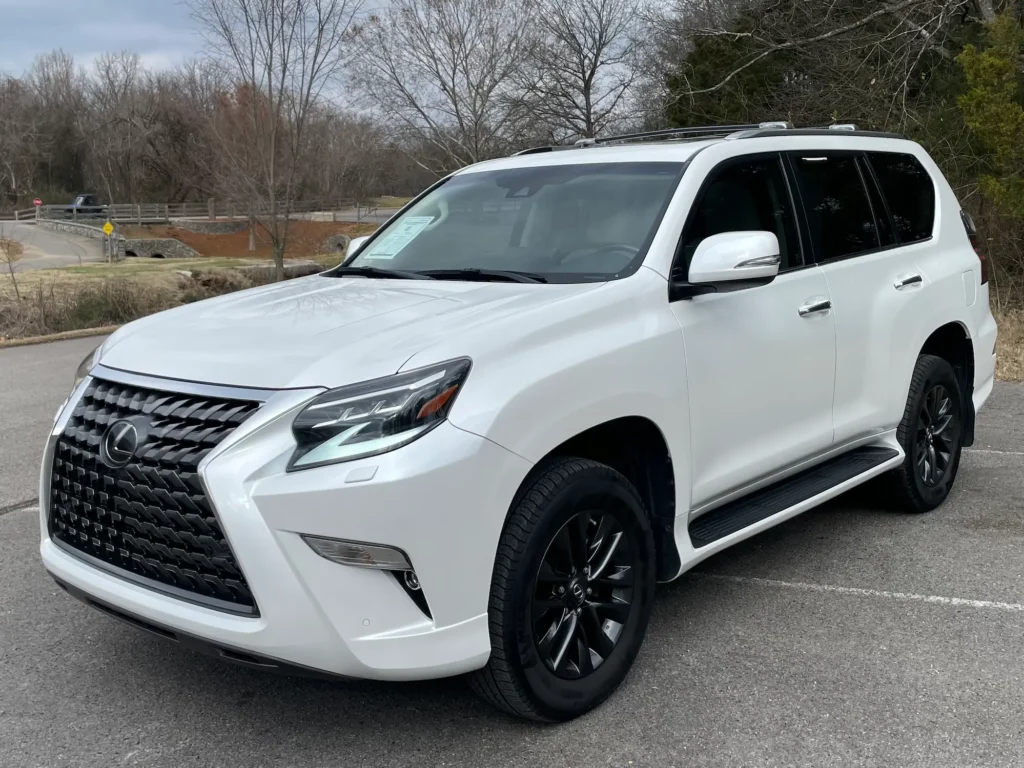 2023 Lexus GX 460 white SUV with black grille, parked outdoors in Brentwood, TN.