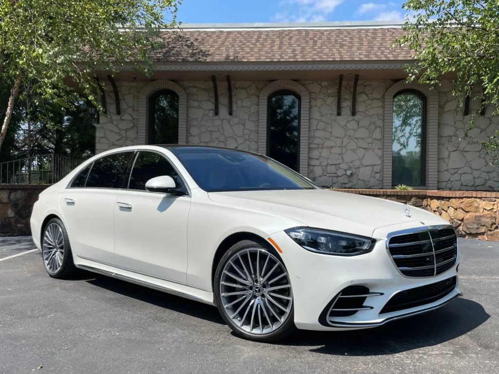 2023 Mercedes-Benz S580 in white parked at AutoPro Nashville with elegant styling