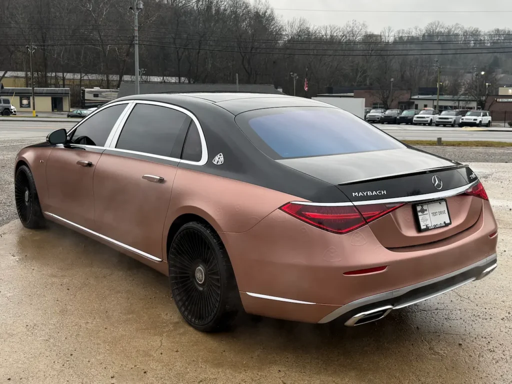 2023 Mercedes-Benz S680 Maybach two-tone black and bronze rear exterior with chrome trim and Maybach badging.