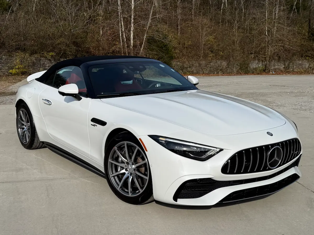 White 2023 Mercedes-AMG SL43 convertible with black fabric soft top