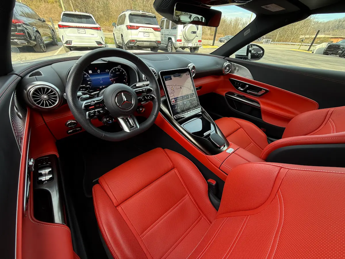 Red leather interior and dashboard of a 2023 Mercedes-AMG SL43 roadster