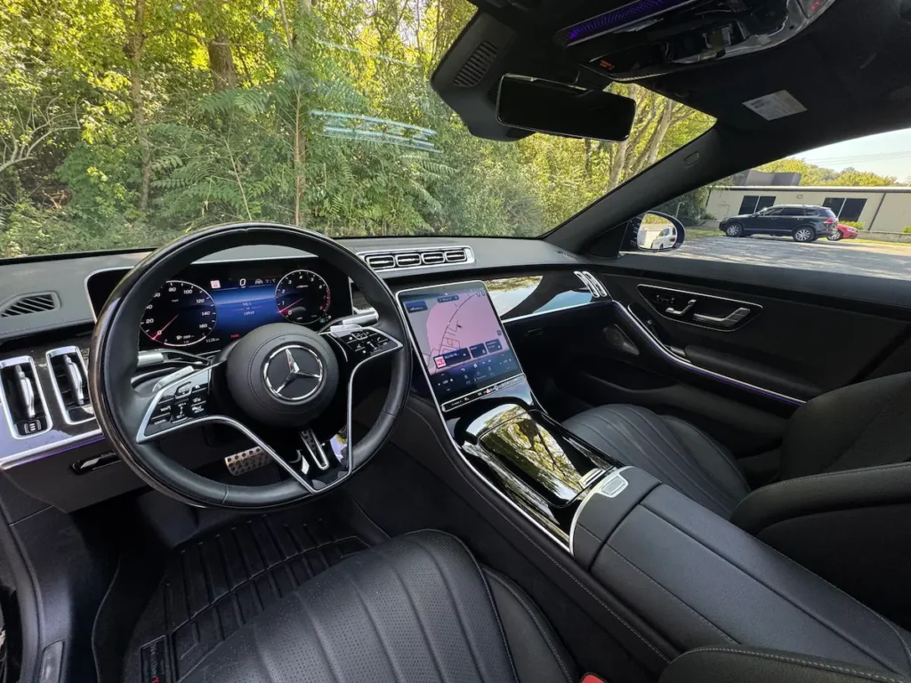 2023 Mercedes-Benz S 500 interior showing leather seating, digital display, and luxury cabin design
