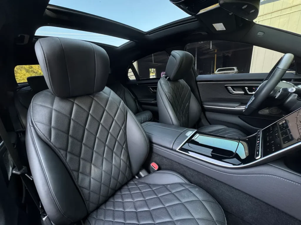 Front seats of the 2023 Mercedes-Benz S500 featuring quilted leather upholstery and advanced console layout.