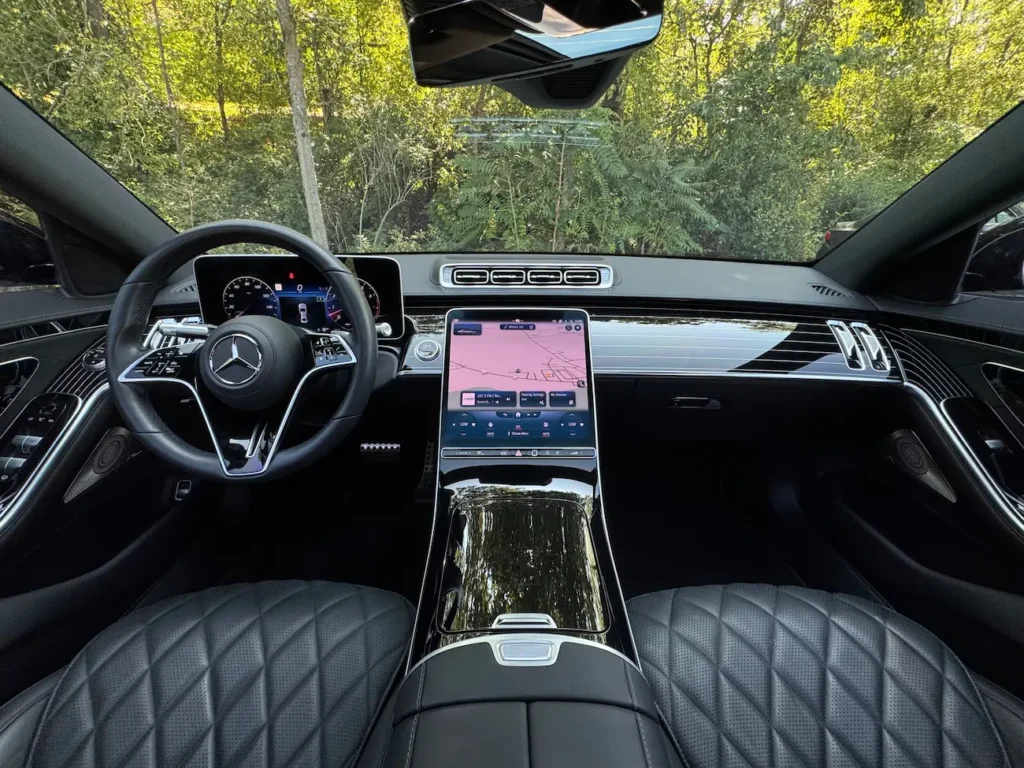 Interior of the 2023 Mercedes-Benz S500 with quilted leather seating and digital displays.