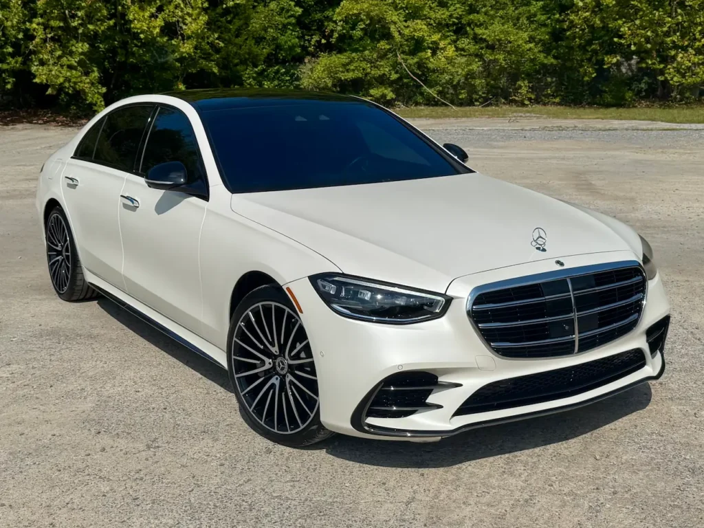 Front angle of the 2023 Mercedes-Benz S500 in white showing modern styling and elegant details.