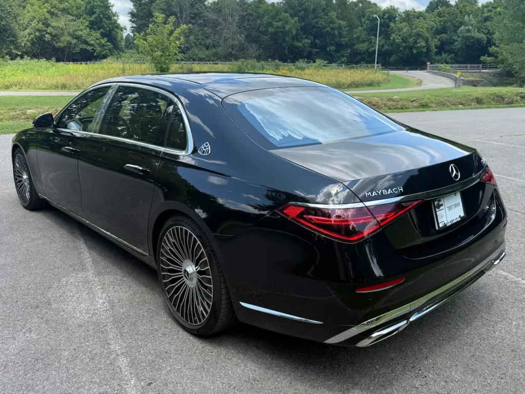 Rear design of 2023 Mercedes-Benz S580 Maybach with LED taillights, chrome accents, and Maybach emblem.
