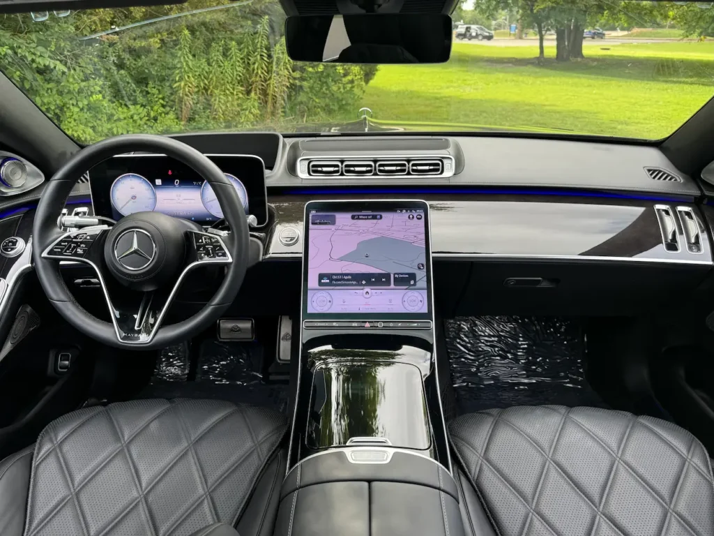 Dashboard and steering wheel of 2023 Mercedes-Benz S580 Maybach with digital cockpit and OLED display.
