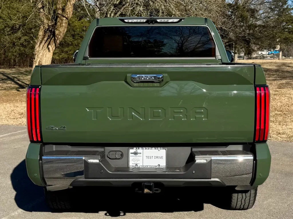 Rear tailgate view of green 2023 Toyota Tundra 1794 Edition pickup