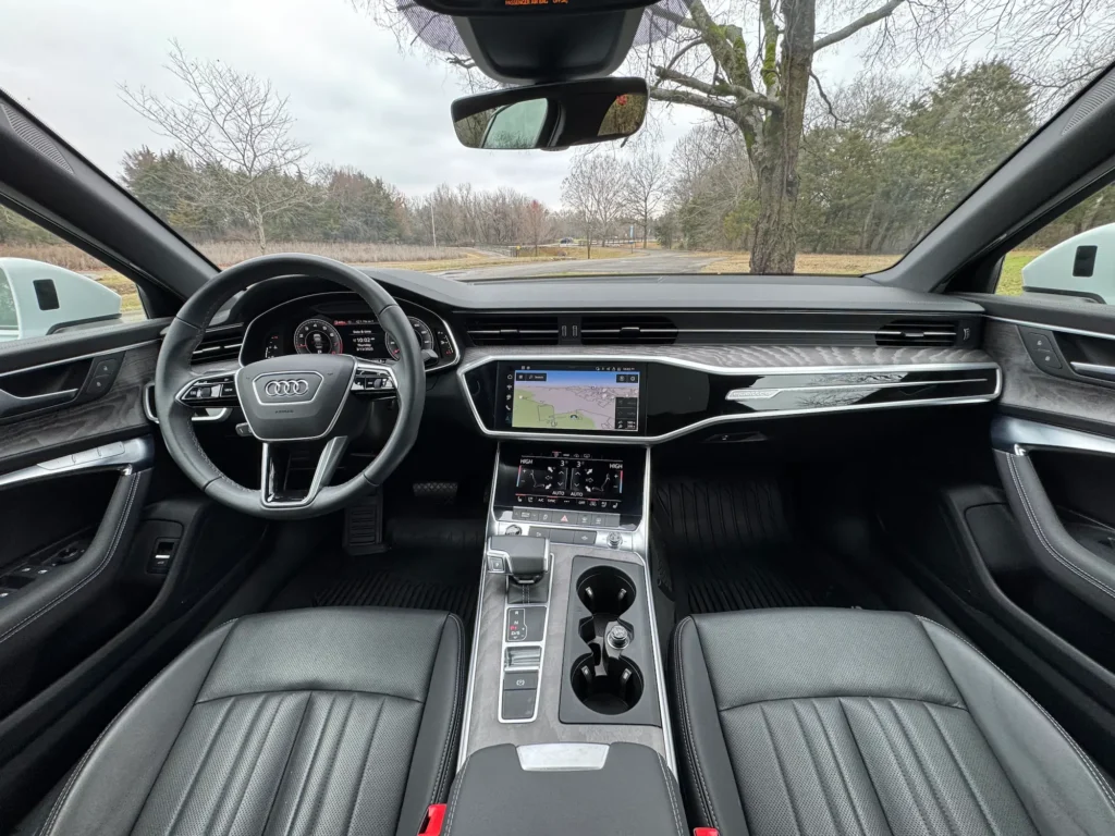 Front cabin of the 2024 Audi A6 with leather seats, dual touchscreen MMI® system, and a digital cockpit at AutoPro Nashville.