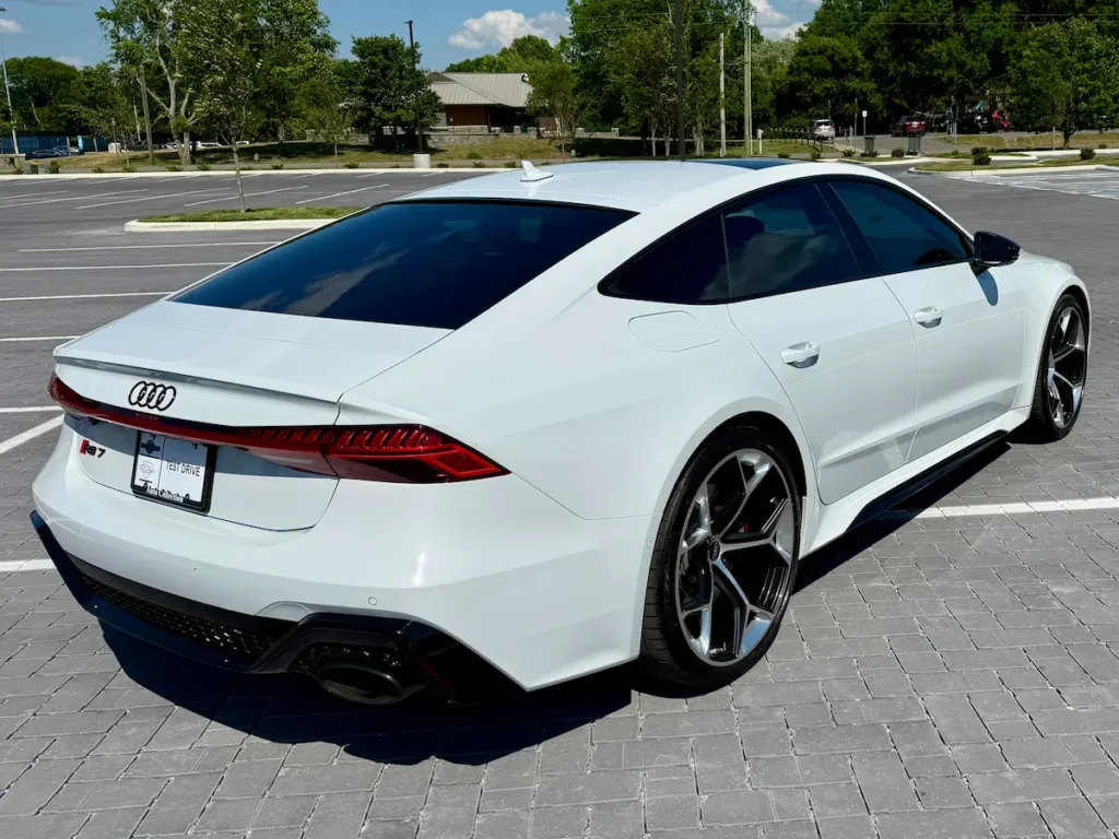 2024 Audi RS7 white sportback rear view with performance styling