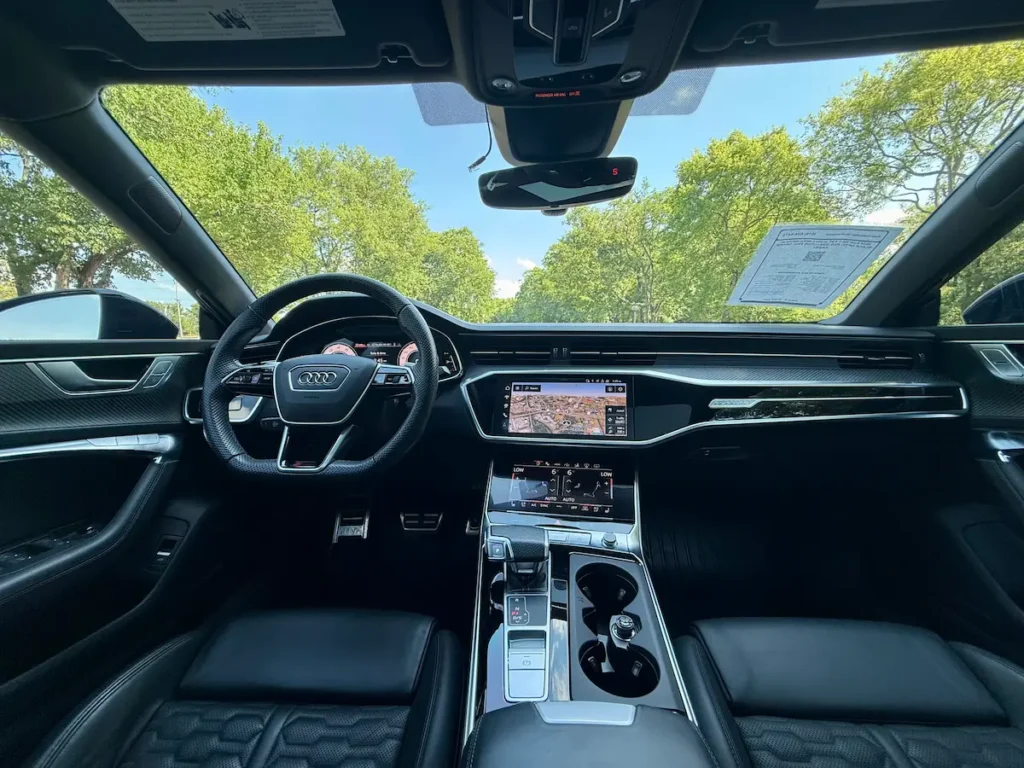 2024 Audi RS7 interior with digital cockpit and black leather seats