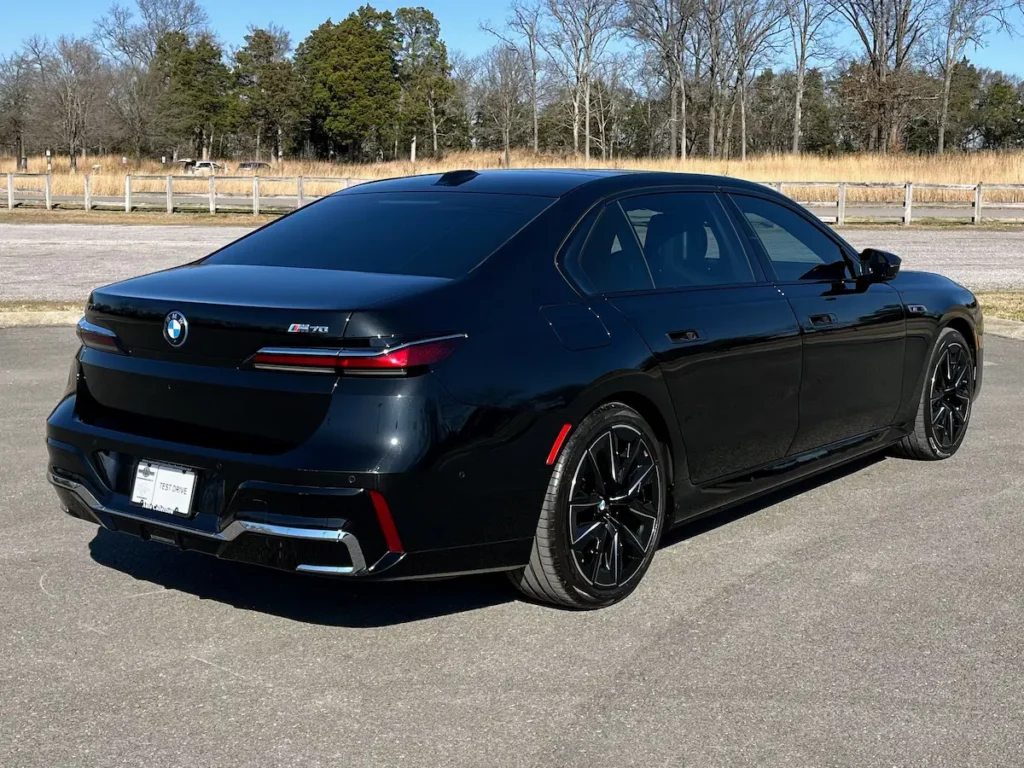 2024 BMW i7 black electric luxury sedan rear exterior view