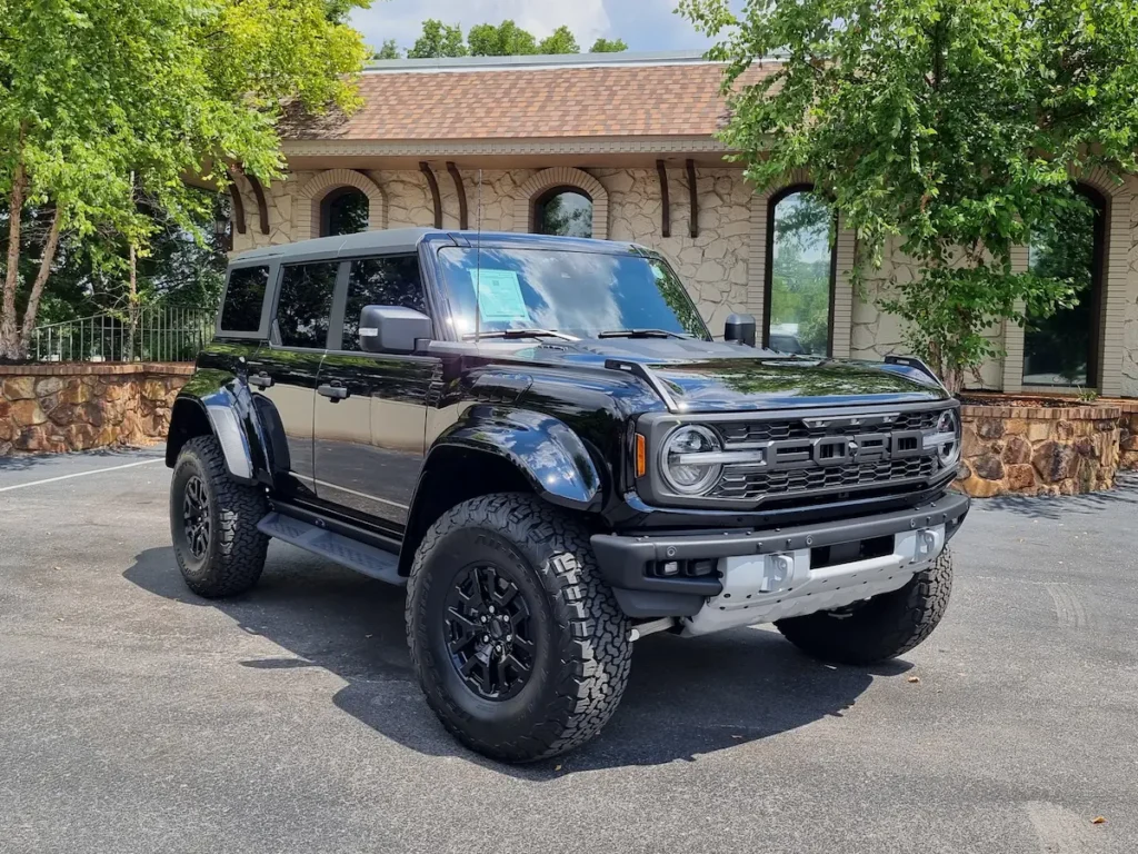 2024 Ford Bronco SUV in black with off-road tires and adventure-ready design.