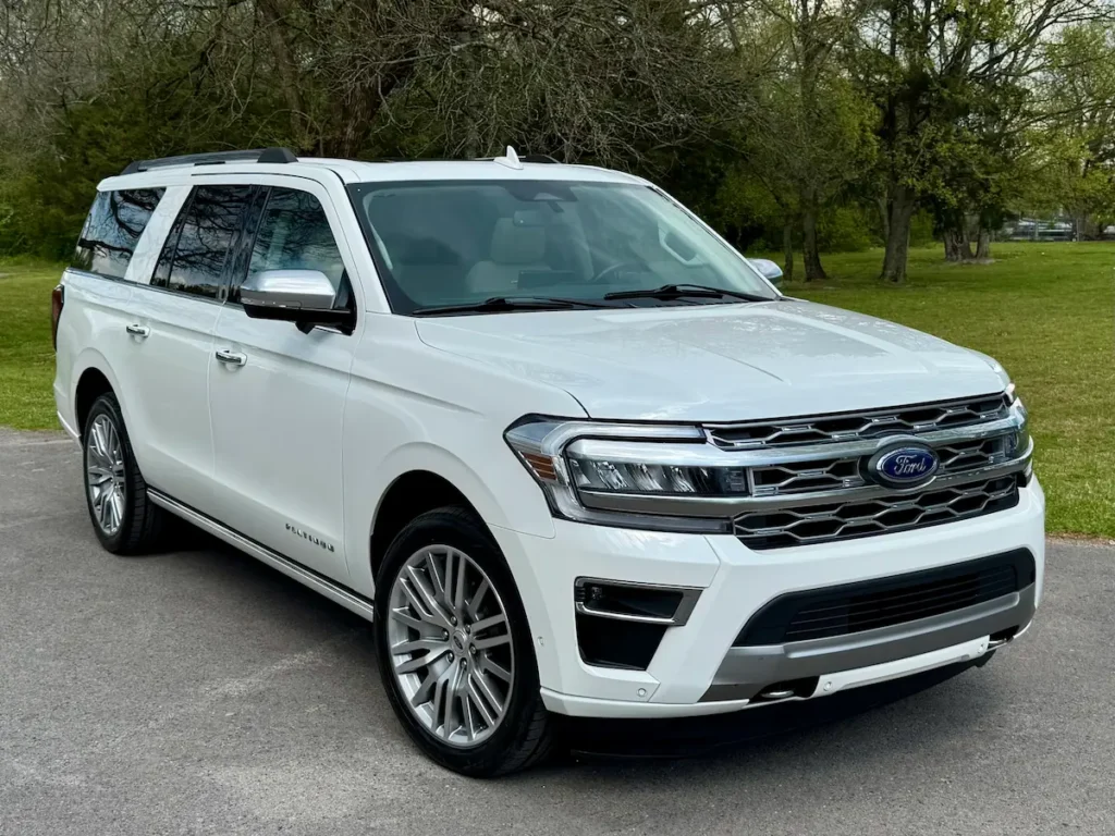 2024 Ford Expedition full-size SUV in white with bold front grille and sleek design.
