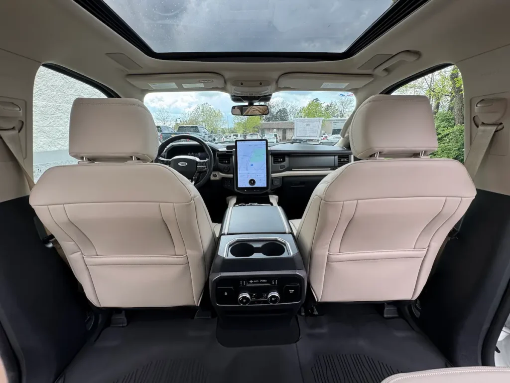 2024 Ford Expedition interior showing panoramic sunroof and digital display.