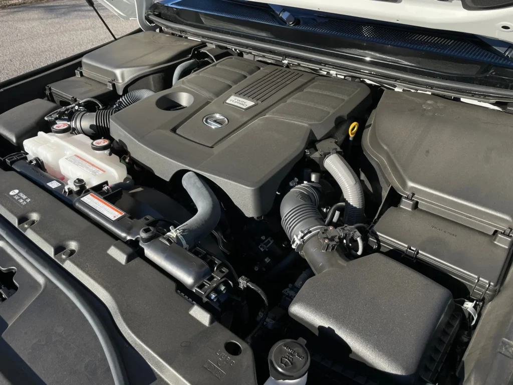 Close-up of the Lexus GX 550 engine bay featuring the powerful twin-turbocharged V6 engine.